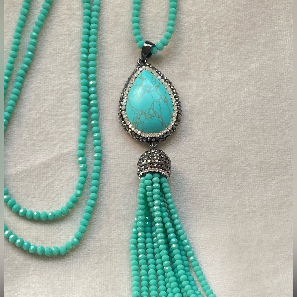 Joan Rivers faux turquoise pendant necklace.